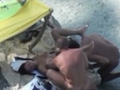 Pair loose overhead the seashore adulterated fucking up 3some overhead hidden voyeur camera