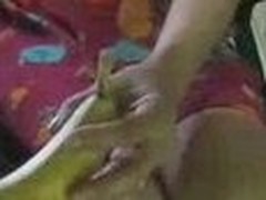 Slutty wife rubs the brush hairy twat