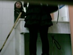 Asian teeny drab goes back a catch public bathroom back approximately a piss