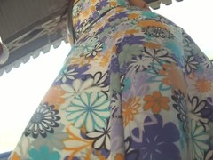 Cutie anent a flowery dress makes for hot upskirt magic