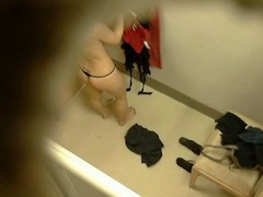 Hidden camera close to changing room gets naked brunette